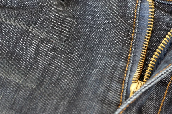 Textur aus blauer Jeans und Reißverschluss. — Stockfoto