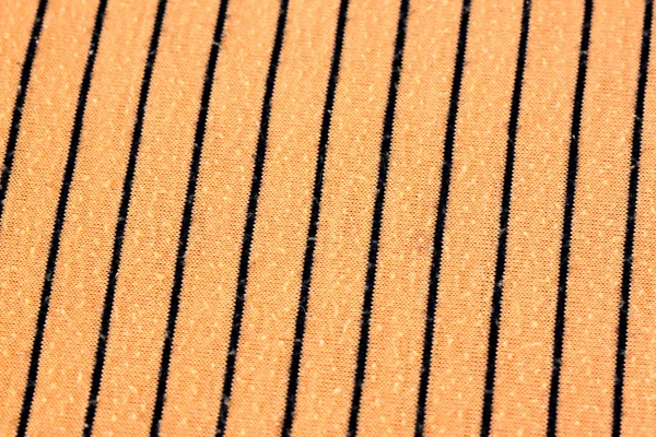 Orange alternating black fabric. — Stock Photo, Image