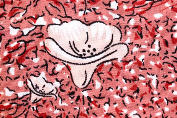 Дизайн рисунка из красного цветка на ткани . — стоковое фото