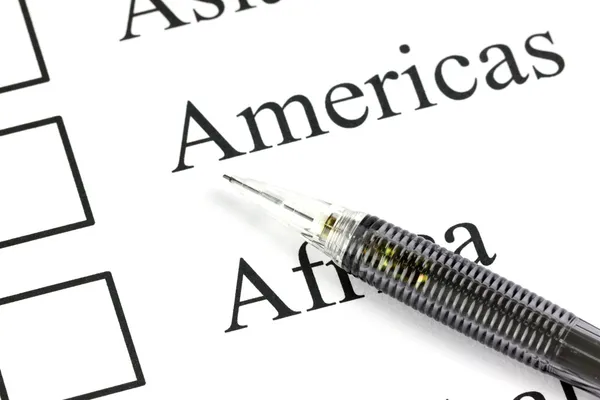 Mechanical pencil point to Checkbox in Americas text. — Stock Photo, Image