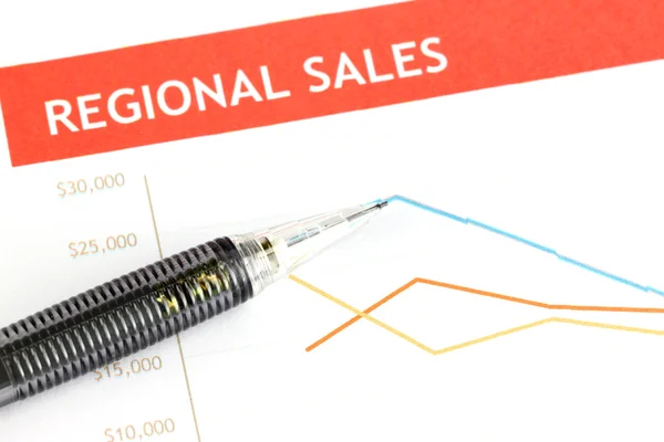 Mekaniska penna peka på prick på regional försäljning diagram. — Stockfoto