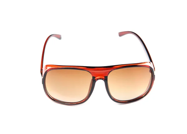 Primo piano occhiali da sole marroni isolati . — Foto Stock