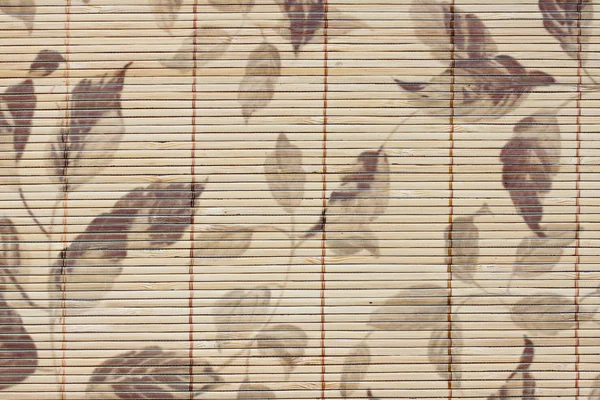 Pattern leaves on bamboo wood of background. — Stock Photo, Image