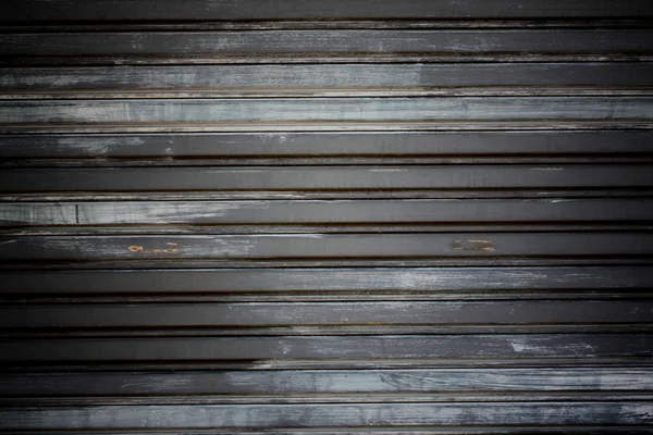 Wall of old color steel rolling door. — Stock Photo, Image