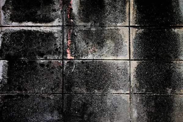 Старая цементная стена темного цвета . — стоковое фото