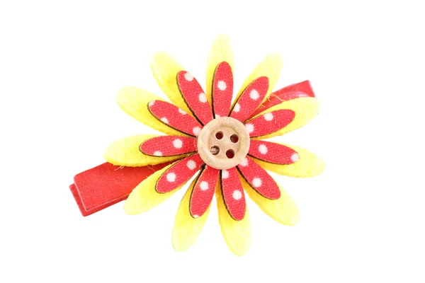 Czerwony i żółty Spinka sztuczny kwiat na białym tle. — Zdjęcie stockowe