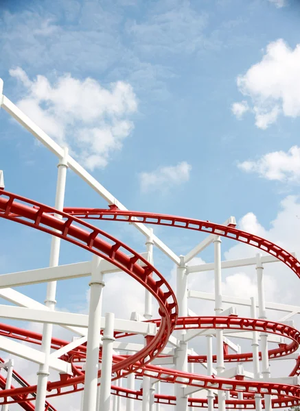 Roller of coaster against blue sky. — Stock Photo, Image