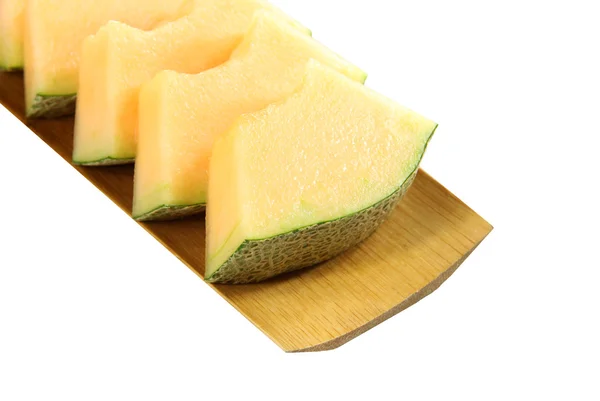 Cantaloupe melon cut into slices isolated. — Stock Photo, Image