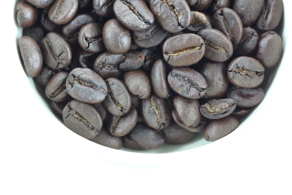 Granos de café en tazas blancas . — Foto de Stock