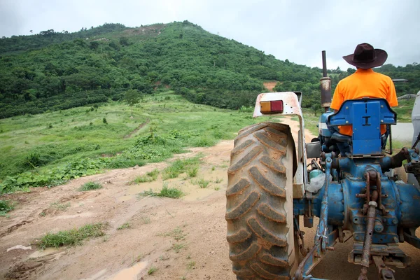 Farmer driving tractor. — Stock Photo, Image