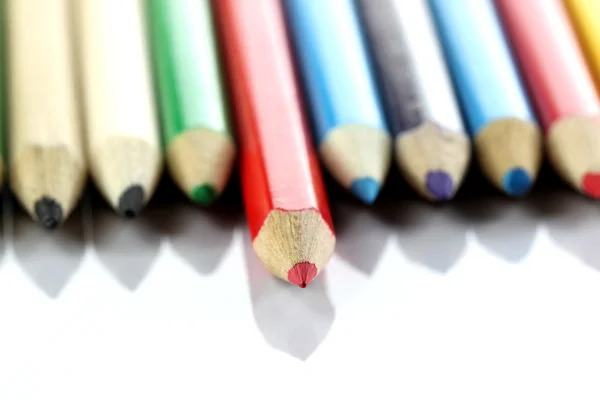 Several colored of crayon is arranged on white. — Stock Photo, Image