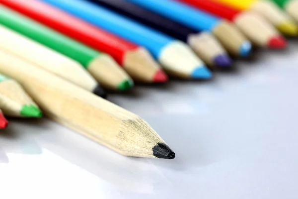 Several colored of crayon is arranged on white. — Stock Photo, Image