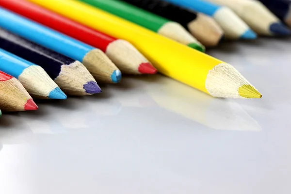 Several colored of crayon is arranged on white. — Stock Photo, Image