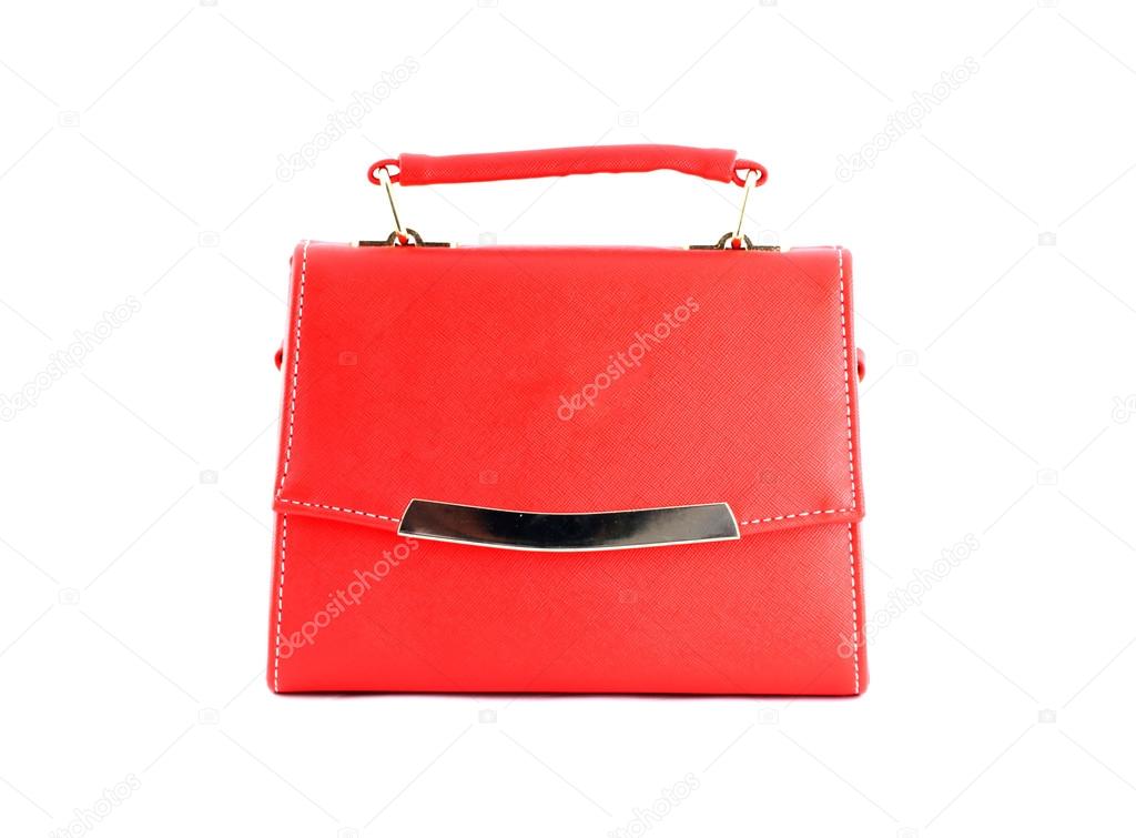 Red handbag of texture leather isolated on white.