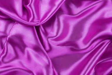 Purple wrinkled cloth background for design in your work concept.