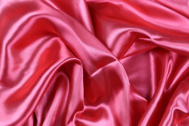 Red wrinkled cloth background for design in your work concept.