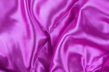 Purple wrinkled cloth background for design in your work concept.