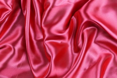 Red wrinkled cloth background for design in your work concept.