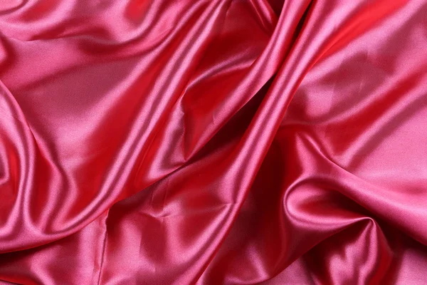 Red wrinkled cloth background for design in your work concept.
