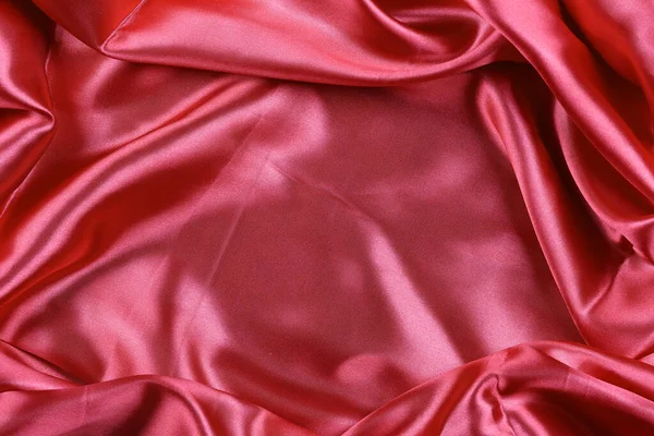Red wrinkled cloth background for design in your work concept.
