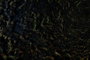 Çalışmalarınızda tasarım için siyah altın granit arka planının yüzeyi.