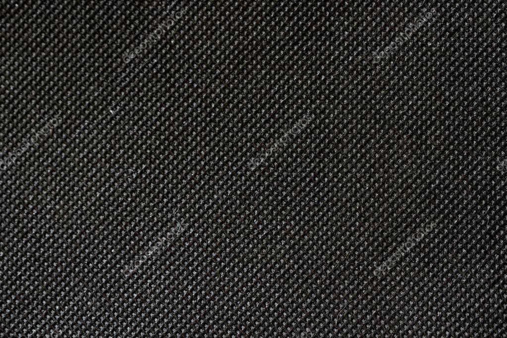 High resolution texture of black cloth with holes in staggered r Stock ...