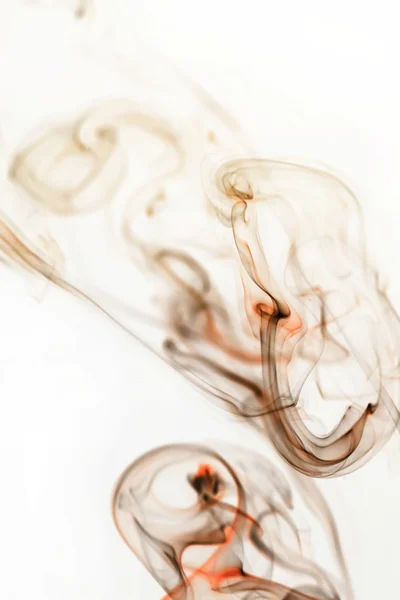 Swirling smoke from the incense on a homogeneous background — Stock Photo, Image