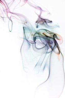 dönen homojen bir arka plan üzerinde Tütsünün dumanı