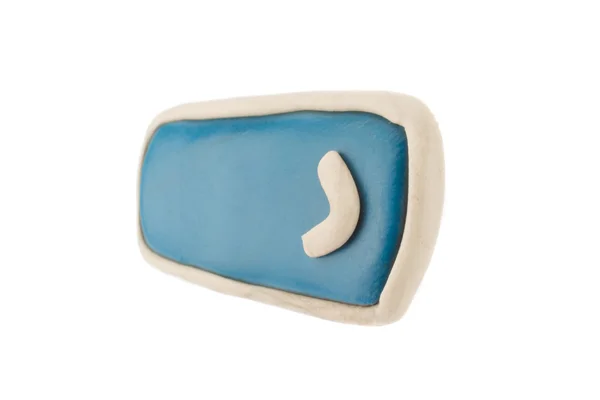 Botão azul com uma seta feita de plasticina em uma ba branca — Fotografia de Stock