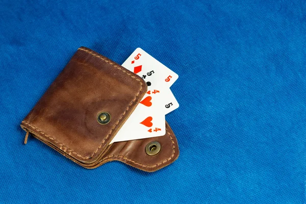 Purse made of leather and playing cards — Stock Photo, Image