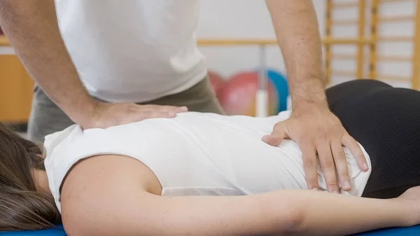 Medical back massage during a rehabilitation — Stock Photo, Image