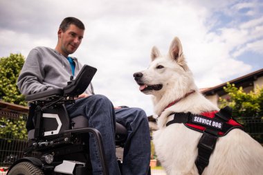 Man with disability and service dog clipart