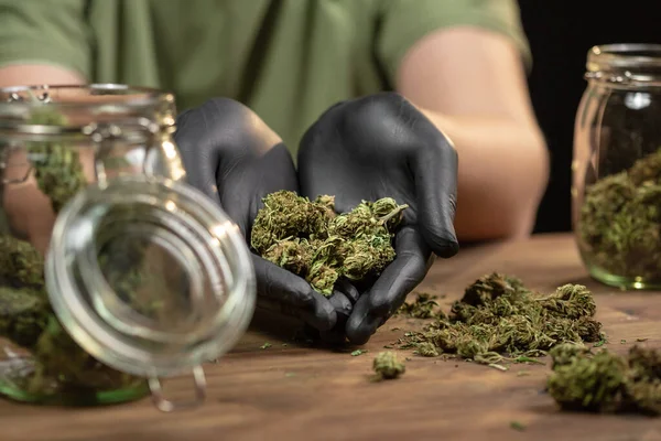 Cannabis buds in a glass jar — Fotografia de Stock