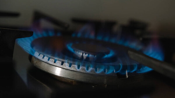 Turning on the kitchen burner