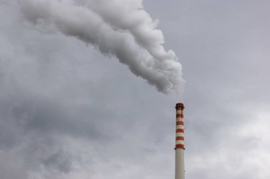 Thermal power plant cooling tower releasing smoke and co2 rich emissions polluting the air
