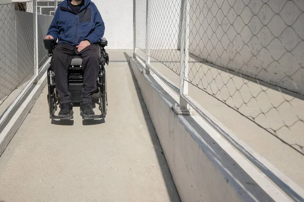 Man Electric Wheelchair Moving Concrete Accessibility Pathway Building Concept Wheelchair — ストック写真