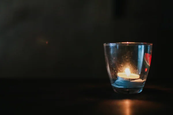 Glass Candle Wooden Table Focus Right Glass Shallow Depth Field — Zdjęcie stockowe