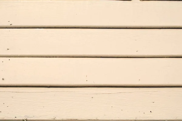 White wooden planks with sunlight realistic texture and background. Outdoor exterior. Wooden surface with copy space