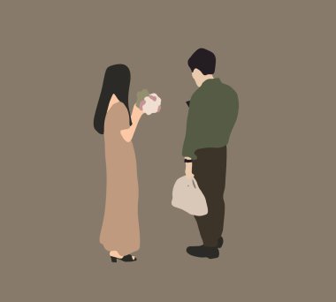 Elinde çiçekle telefonunda oynayan bir adam. Romantik çift buluşması. Bir adam sevgilisine çiçek sunar. Mutluluğu hisset.
