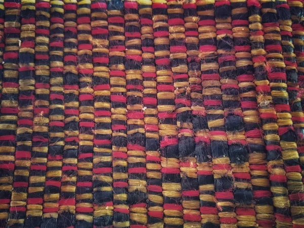 close-up of colorful knitted pattern of wool
