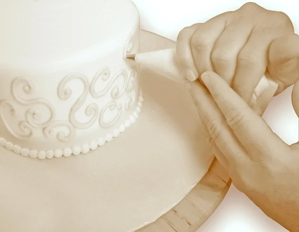 Decorating a Cake Royalty Free Stock Images