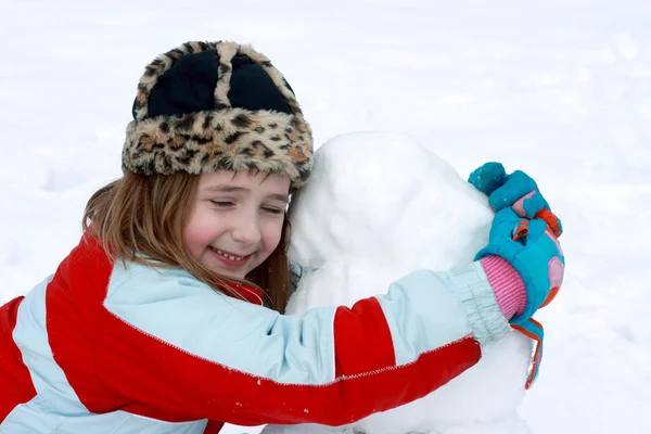 Feliz con su muñeco de nieve — Foto de Stock