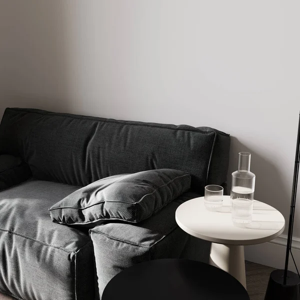 close up of black sofa with black coffee table in bright room with white wall, 3d rendering