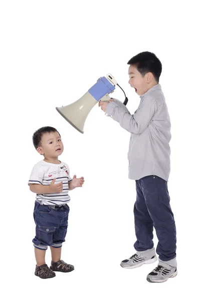 Criança grita com megafone — Fotografia de Stock