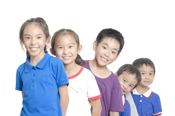 在白色背景上微笑着的五个孩子 图库图片