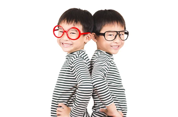 Two brother smiling and raising his finger — Stock Photo, Image