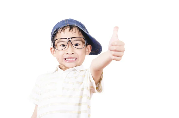Joyful little boy holding his thumb up — Stock Photo, Image