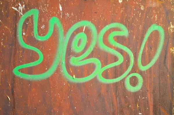 "igen "írta a rozsdás háttérben — Stock Fotó