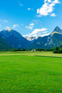 Evening stroll through the attractive town of Bovec near the border with Italy - Slovenia clipart