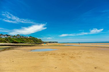 Beach walk on the beautiful Gold Beach off the coast of Ver-sur-Mer - Normandy - France